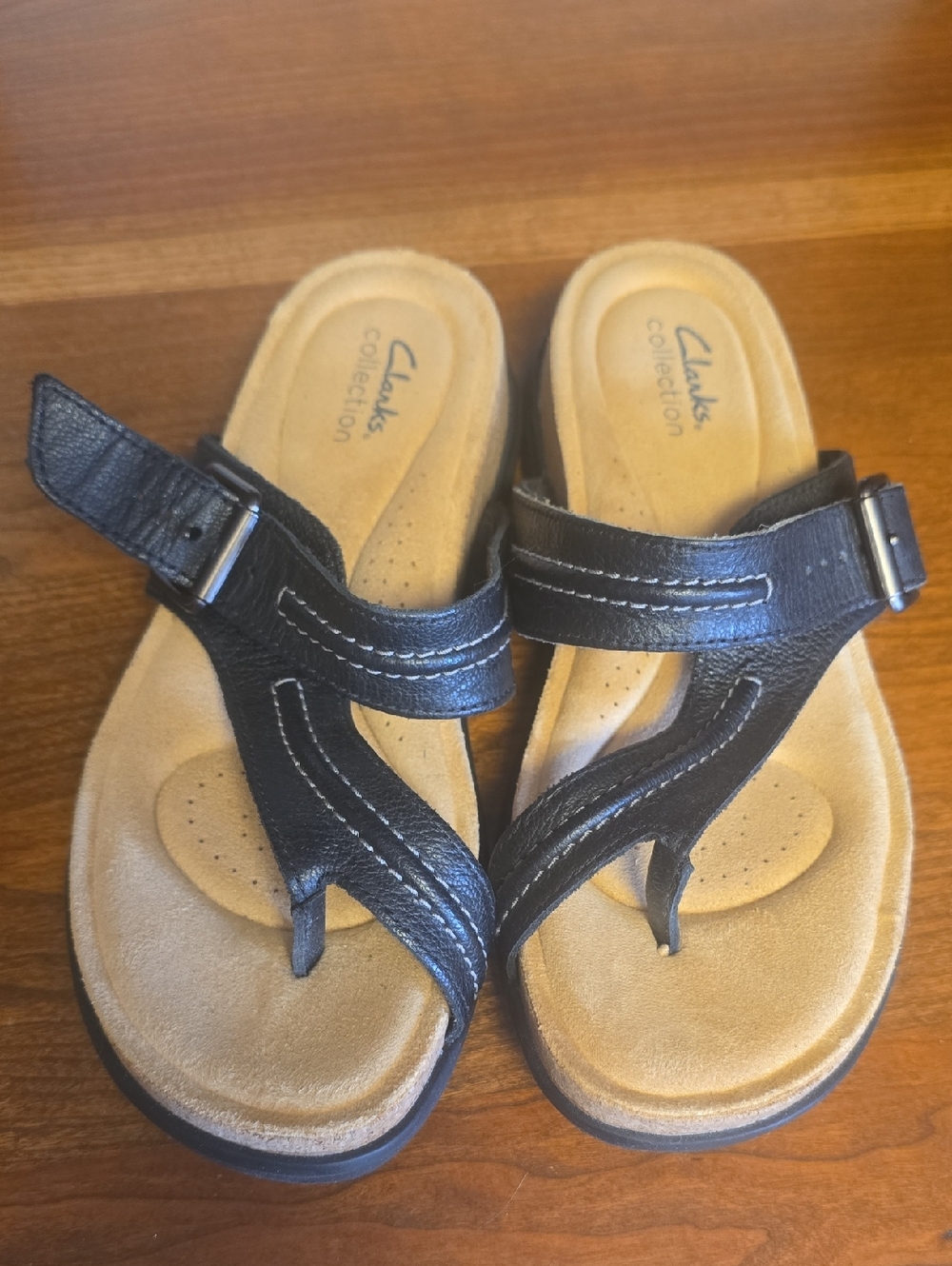 Clarks Black Leather Thong Sandals with Tan Footbeds